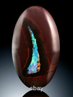 A one of a kind polished Boulder Opal showing Opal running through out the piece