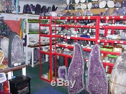 Amethyst polished display piece on iron stand De14