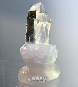 Buddha (reverse cut Clear Quartz) (lavender Fluorite stand) 2 piece statue