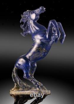 Carved from a single piece of lapis lazuli is this impressive stallion carving