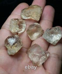 Facet grade Golden Rough Topaz Crystal with nice color from Pakistan. 13 pieces
