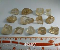 Facet grade Golden Rough Topaz Crystal with nice color from Pakistan. 13 pieces