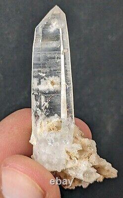 Flat of 23 pieces of clear Quartz crystals with rutile inclusions