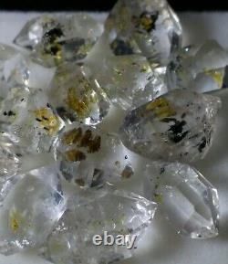 Petrolium diamond quartz Crystals 13 pieces with Yellow petrol dots fluorescent