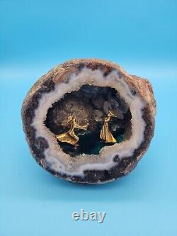 Quartz Geode Crystal Rock with Scene of Play Figurines inside of it Cool Piece