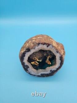 Quartz Geode Crystal Rock with Scene of Play Figurines inside of it Cool Piece