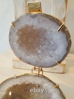 Quartz crystal ball 2 pieces polished in holder