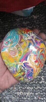 Rock painted by a girl on LSD she has no idea how she did it LOL real fine piece