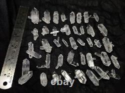 Top quality Quartz clusters with Faden structures. 158 grams and 40 Pieces