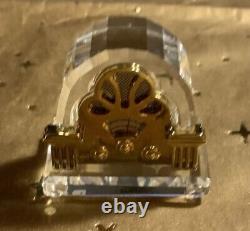 4 Miniatures de cristaux Swarovski incluant des horloges secrètes