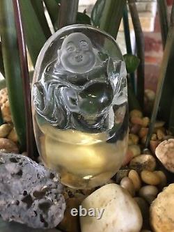 Pièce de main de Bouddha en cristal